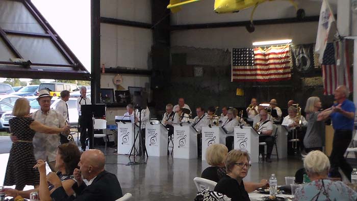 Guests entering Hangar B for the USO-style dance